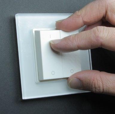 4 Last, hold the dimmer up to the mounting location and make sure the buttons match the correct