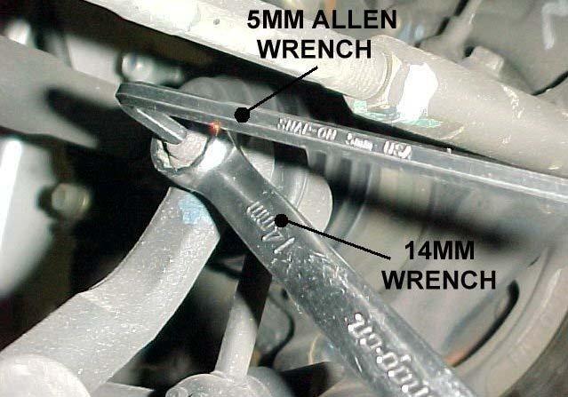 Use a 14mm wrench and a 5mm Allen wrench to remove