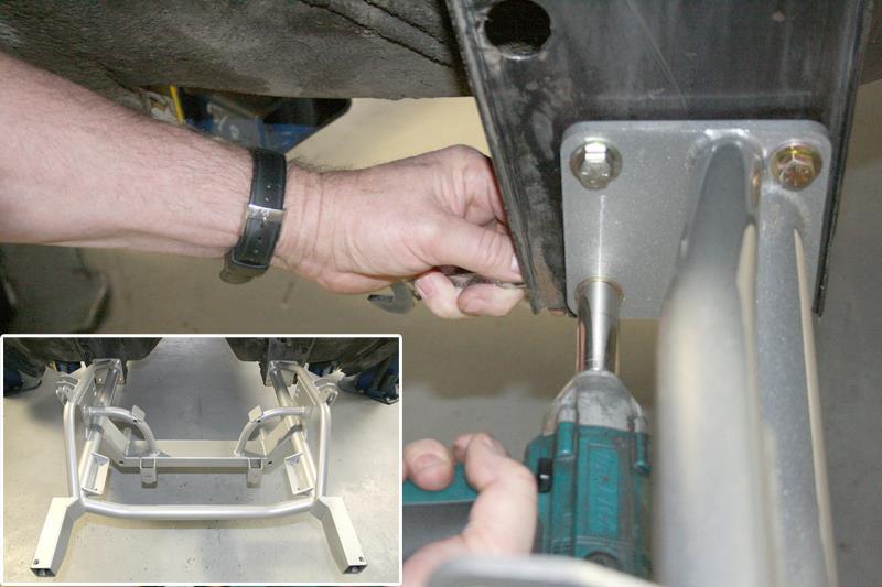5. Finish Bolting Clip to Car. Install the balance of the washers and lock nuts and tighten securely as shown. The lower portion of the clip fully installed is shown in lower picture.