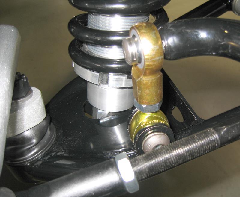 Install the saddle over the urethane blocks and position under the sway bar mounting brackets on the clip.