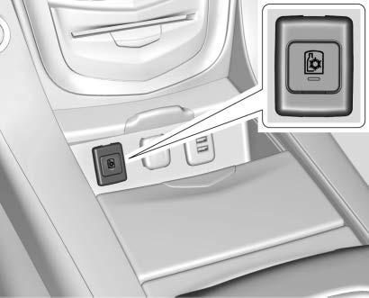 On the rear of the console there are auxiliary jacks, a power outlet, and a storage area. See Power Outlets 0 125 and the infotainment manual.