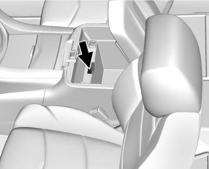 To start the vehicle: 1. Open the center console storage area and the storage tray.