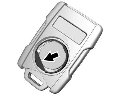 30 Keys, Doors, and Windows 2. Press and slide the battery down toward the pocket of the transmitter in the direction of the key ring. Do not use a metal object. 3. Remove the battery. 4.