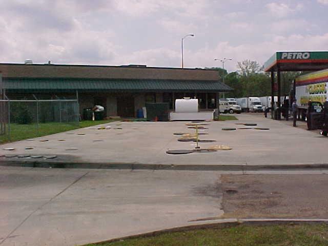 SPILL BUCKETS: OPW 1 PETRO STOPPING CENTER JACKSON, MS Six 20,000 gallon tanks installed May 1999 One regular