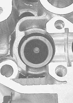 Attachment 09916-84511: Tweezers Remove the valve spring
