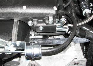 Be sure to route the hose between the coil bracket and intercooler hose.
