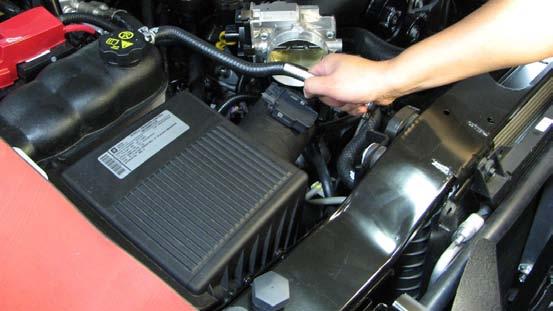 Replace the factory air filter with the supplied Green reusable air filter.