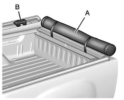 toward the tailgate. Align the rear edge of the side rail (B) with the inside edge of the tailgate (D). 2.