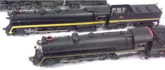 The N-Gauge community is not without it s NC&StL following a VO-1000 switcher hauls a string of Dixie Line
