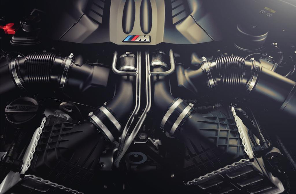 TRACK STAR. The 4.4 M TwinPower Turbo V-8 in all BMW M6 models is a kissing cousin to our all-out racing engines.