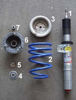 Parts list Front Axle 1. Suspension strut with spring cap and counter ring 2. Front-axle spring 3. Spring cap (OE part) 4. Support washer (OE part) 5. Lubricating washer (OE part) 6.