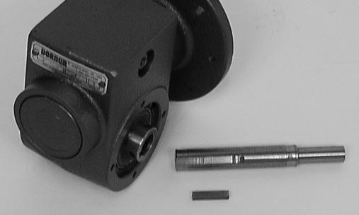 Loosen drive pulley set screws (X of Figure 13).