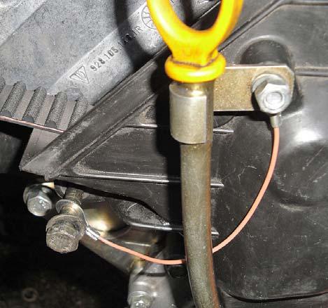the dipstick tube out of the way.) Install original tensioner bolt 15ft.lbs.