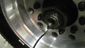 until approx. six inches of tubing extends out of the axle end.