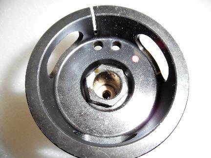 7-4 Rotate the vent holes of the spindle plug to the 12:00 o clock position and while