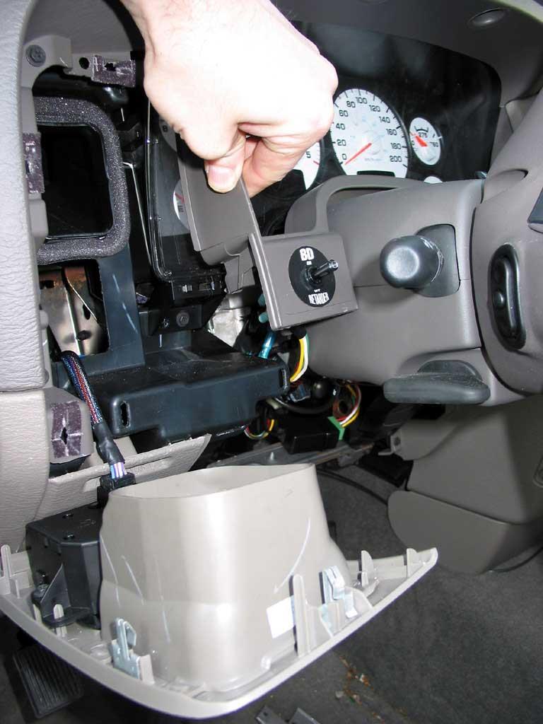 18 Install switch into drilled hole and secure with lock ring then reinstall dash trim panels by reversing the removal
