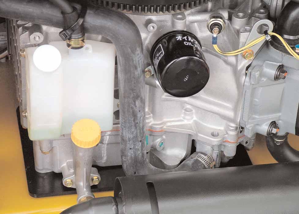 Doing so may induce air into the cooling system and may cause overheating. The coolant level should be between the H and L marks.