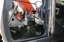 A quieter machine Additional features Cab right protection bars Evacuation hammer Pilot control shut-off lever A number of features make this machine