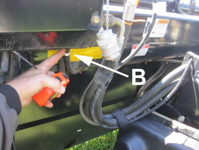 hose runs from the forward port of the motor back to the fitting to which the canvas motor was originally attached.