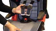 2 Move the head restraint to the lowest position. Move the harness adjuster to the highest position.