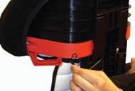 6 Unhook the elastic bands, then remove the cover from the head restraint.