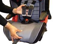Head Restraint Adjustment Child Seat features Overview WARNING: The head restraint adjuster is for booster mode only. DO NOT use the head restraint adjuster when the harness is still attached. 2.