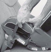 4. Push restraint down firmly into vehicle seat while adjusting seat belt length. Tighten and lock seat belt according to vehicle owner s manual. (Fig.