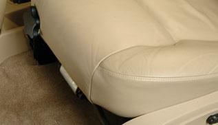 The seat cushion can be raised, lowered, and moved forward or rearward by moving this control in the desired direction. See Section 1 of your Owner Manual.