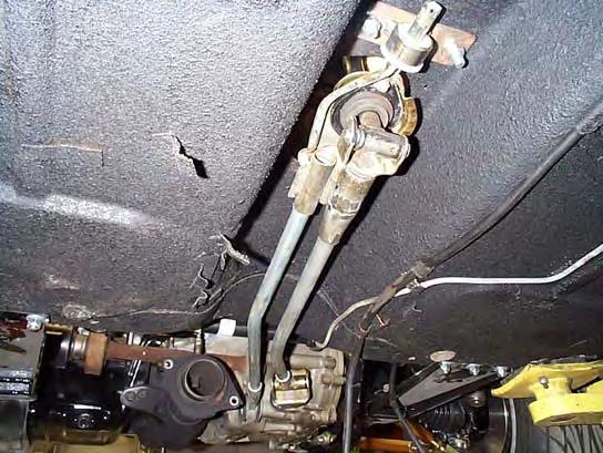 Step 5: Rebuild the shifter linkage using ¾ metal pipe. Bend and weld pipes so that all gears can be easily shifted to and from without hitting the body or anything else.
