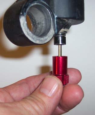 4) Remove the rebound adjuster by pulling it straight down out