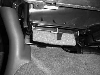 STEP 7: Once the front seats have been removed, you will need to outline the outside of the center console with masking tape(not supplied). This will help in future steps.
