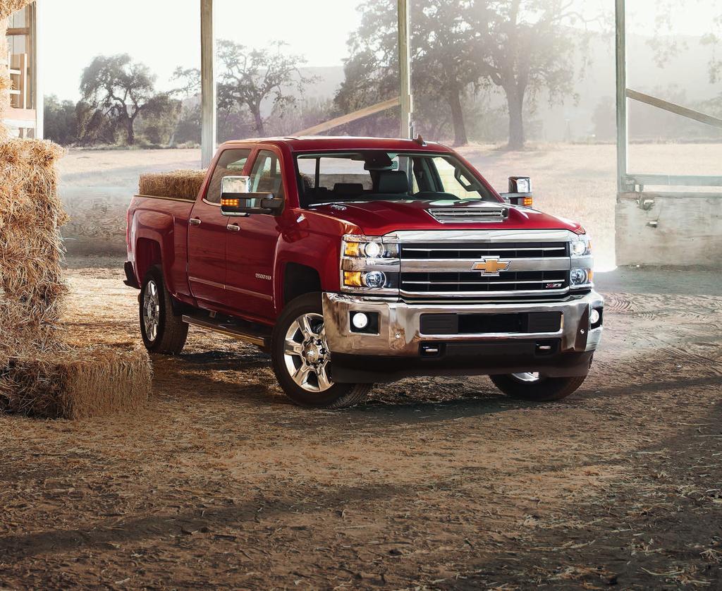 PAYLOAD 2500HD Crew Cab Standard Box LTZ 4x4 in Cajun Red Tintcoat (extra-cost color) with available Duramax 6.6L Turbo-Diesel V8 engine, Z71 Off-Road Package and Chevrolet Accessories.