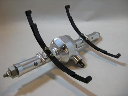 Install the leaf springs with the small one first, then install the main leaf that attaches to the shackles, and then the
