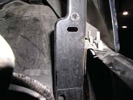 22 Remove the two bolts (10mm) from the driver s and passenger s inner