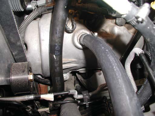 4 Route the 5/8 hose over the blower discharge tube, attach it to the fitting installed in the air filter and secure