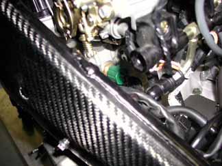 White housing To the engine To the ECU Figure 18: Gear connector particular The on-board Water temperature connector, shown in Figure 19, is a 2 pins / green coloured connector located on the bike s