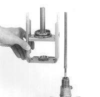 Relieve all pressure on the spring by turning adjusting nut assembly [31]fully right to left (clockwise from top). 3. Figure 6. Loosen lock nut [11] with 1-3/8" open end wrench.
