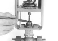 TIghten the gland assembly against the spacer. 17. With valve plug firmly seated, screw stem extension [4] to the dimension shown in Figure 12 and tighten into place with hex nut [12].