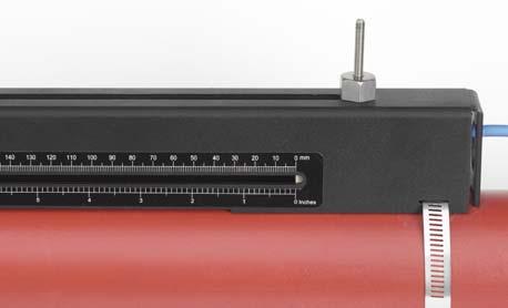 Carefully lower the transducer and cable through the rectangular opening until the slots in the side of the transducer clamp align with the edges on the top of the guide rail. Figure 2.9 6.