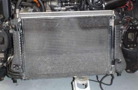 25. To remove the intercooler from the A/C radiator and radiator you will need to support both of them separately.