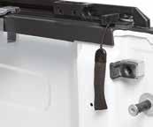 TONNEAUS Pull tabs at both rear corners for convenient operation. No-drill installation clamps secure frame rail assembly to bed.