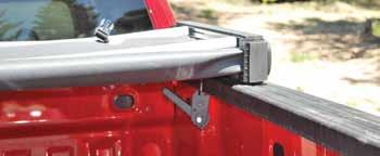 TONNEAUS Heavy duty adjustable clamps secure tonneau to truck bed. Folded and secured in back of cab, the EZ Fold allows for nearly full bed use.