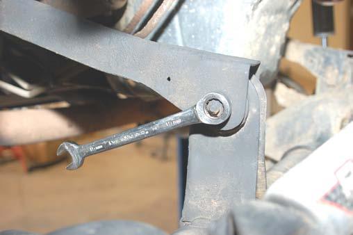 Retain the hardware for reuse. PHOTO 7 PHOTO 8 Remove the upper control arms Remove the mounting hardware 16.