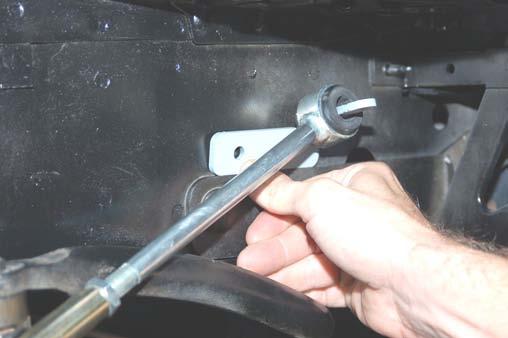 Tighten the jam nut against the rod end using a 5/8 & 3/4 wrench. 49.