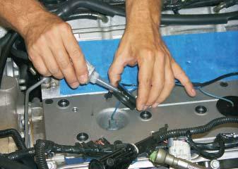 Reinstall the knock sensors and torque them to 15 lb-ft.