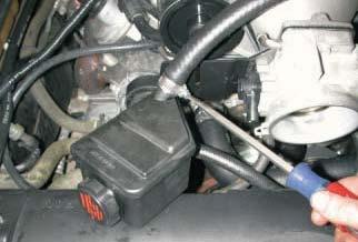 Push the stock fuel lines (one or two) onto the new fuel manifold fi ttings.