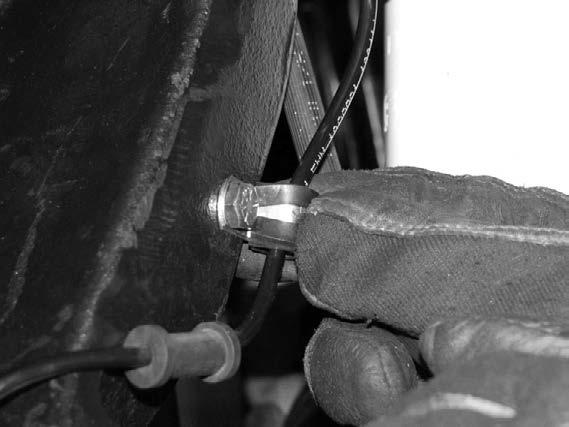 Insert the tie rod into the spindle and torque to