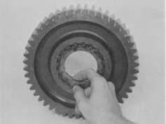 Press the inner bearing and deep reduction gear off the