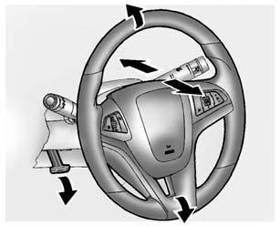 Instruments and Controls 5-5 Controls Steering Wheel Adjustment To adjust the steering wheel: 1. Pull the lever down. 2. Move the steering wheel up or down. 3.