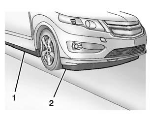 Lower the flatbed onto the set of ramps. { Caution If ramps are not used, the front fascia will come into contact with the flatbed and may cause damage.